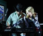 Keyboardist, James Hembree, giving piano instructions at the Ozona Grill in Dallas Texas